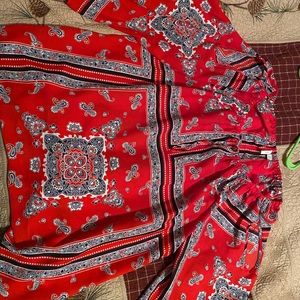 This blouse was only wore one time. It is a cold shoulder top.